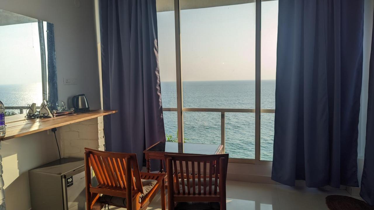 Nebo Hotel Varkala Bagian luar foto